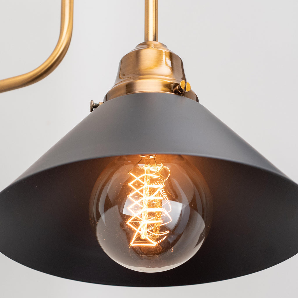 Monel wall sconce