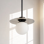 Orbit Mirror pendant light in a sunlit room