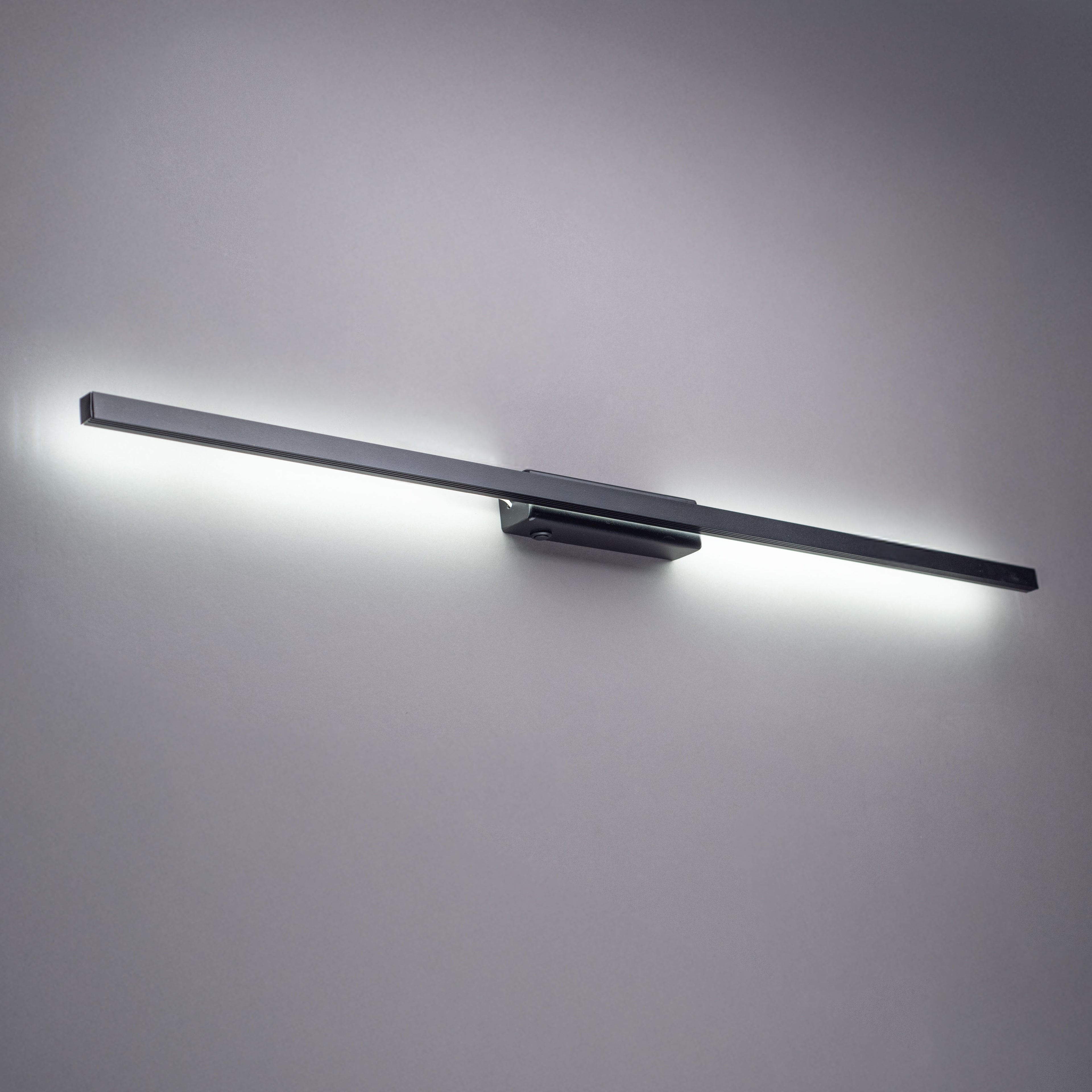 LED Strip wall light glowing on a wall