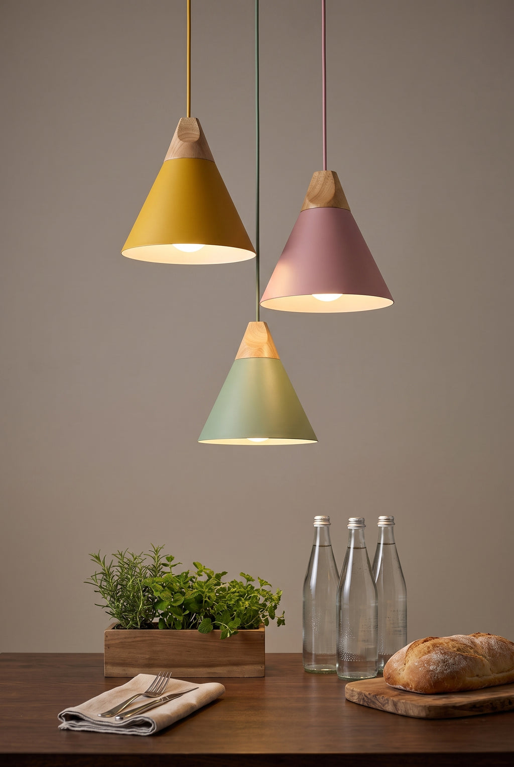 Three Isoni pendants over a simple dining table